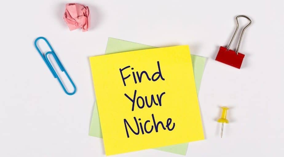 Posted note with find your niche written on it